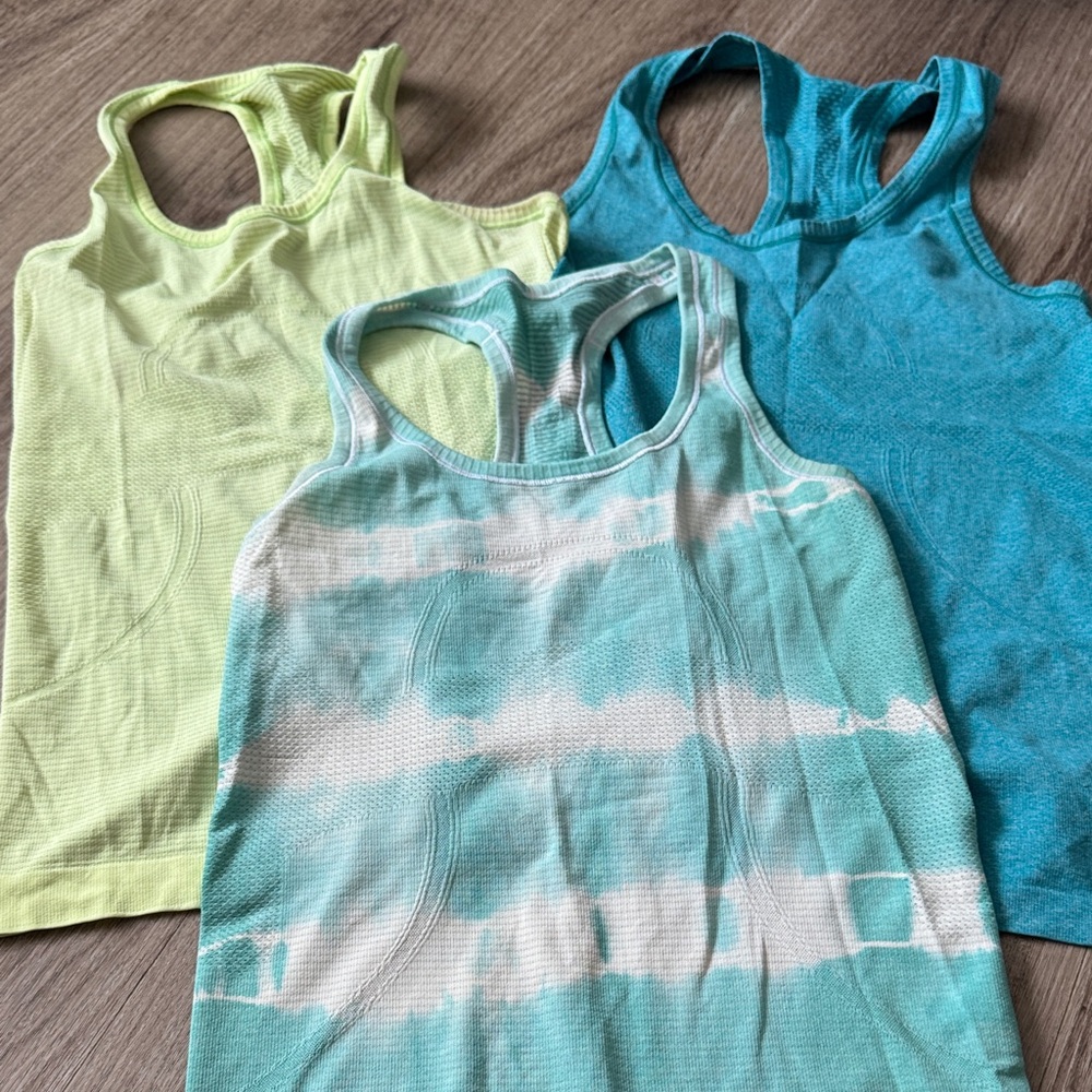 3 lululemon swiftly tanks in blue / green colors